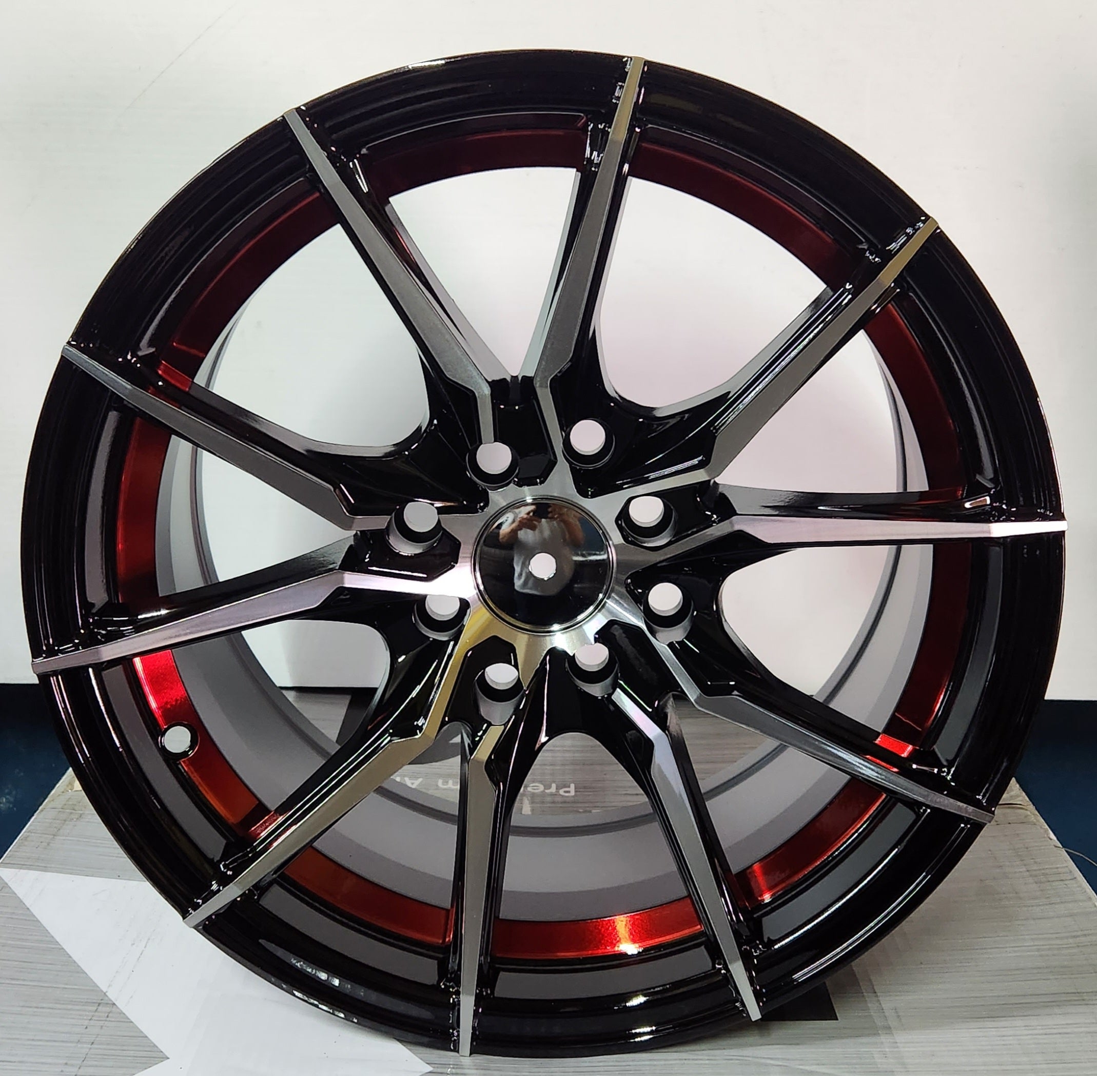 NISOSHI NS 027 15x7 4x100 4x114.3 PIANO BLACK MACHINED FACE WITH RED UNDER CUT - Gun Hill Tire House (WTW - WHOLESALE TIRES & WHEELS)