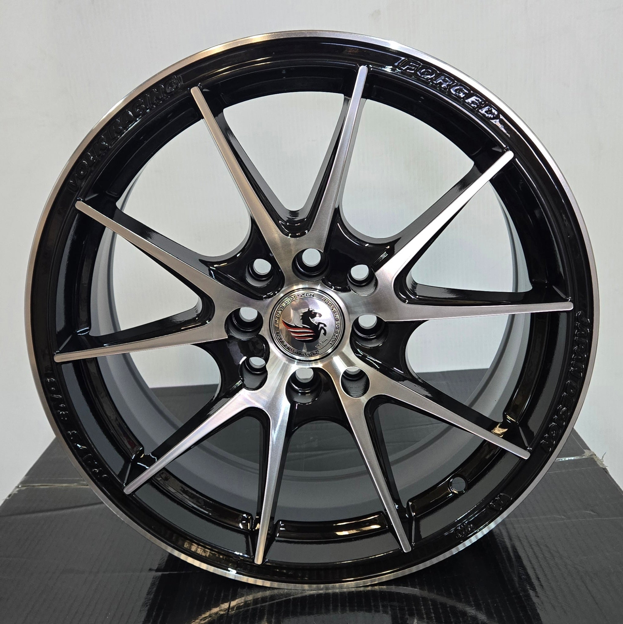 PEGASUS 5286 16x7.0 4x100 / 4x114.3 GLOSS BLACK MACHINED FACE - Gun Hill Tire House (WTW - WHOLESALE TIRES & WHEELS)