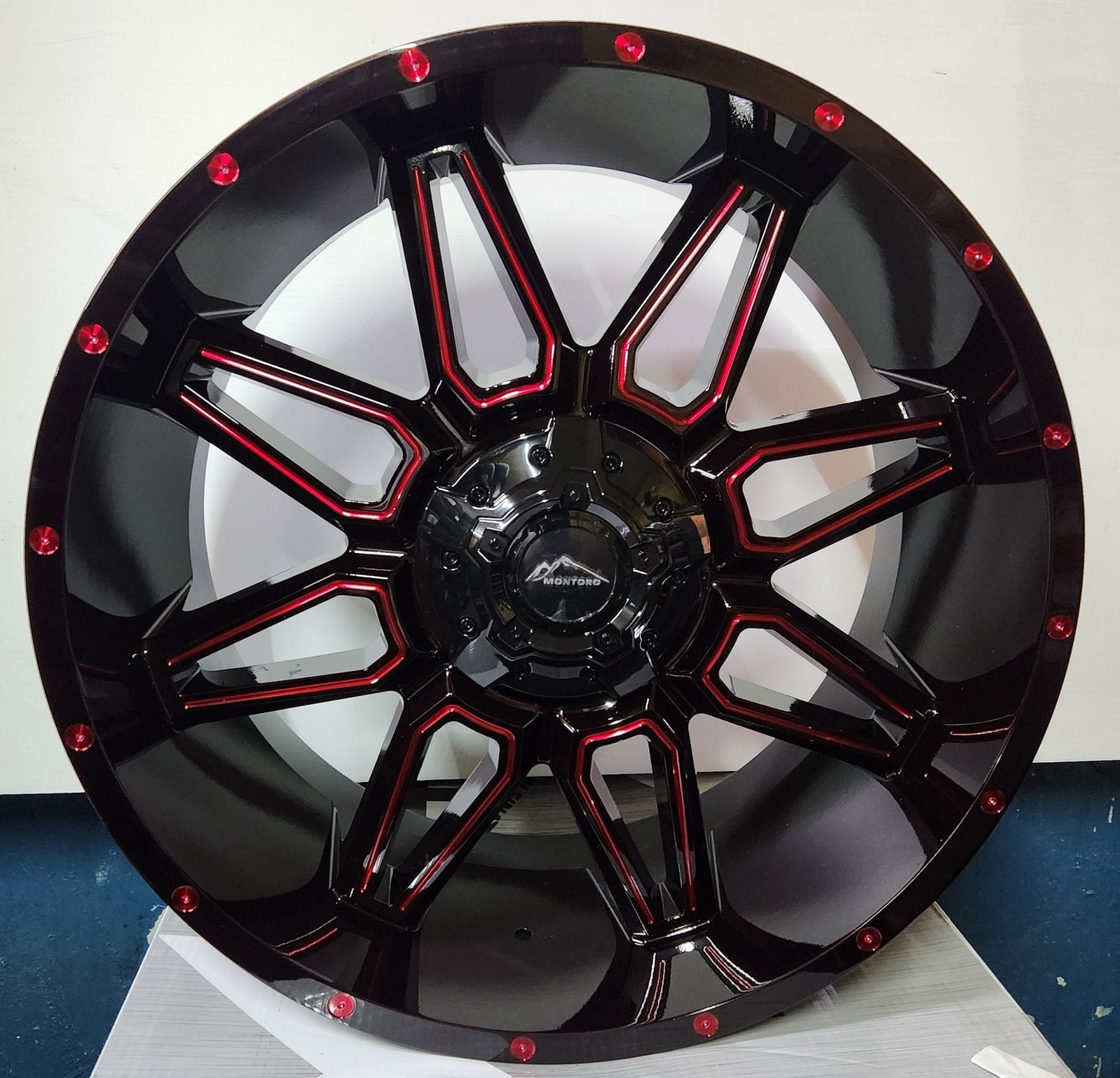 M12 22X10 5X127 MIDNIGHT BLACK MG RED TINT RED RIVETS - Gun Hill Tire House (WTW - WHOLESALE TIRES & WHEELS)