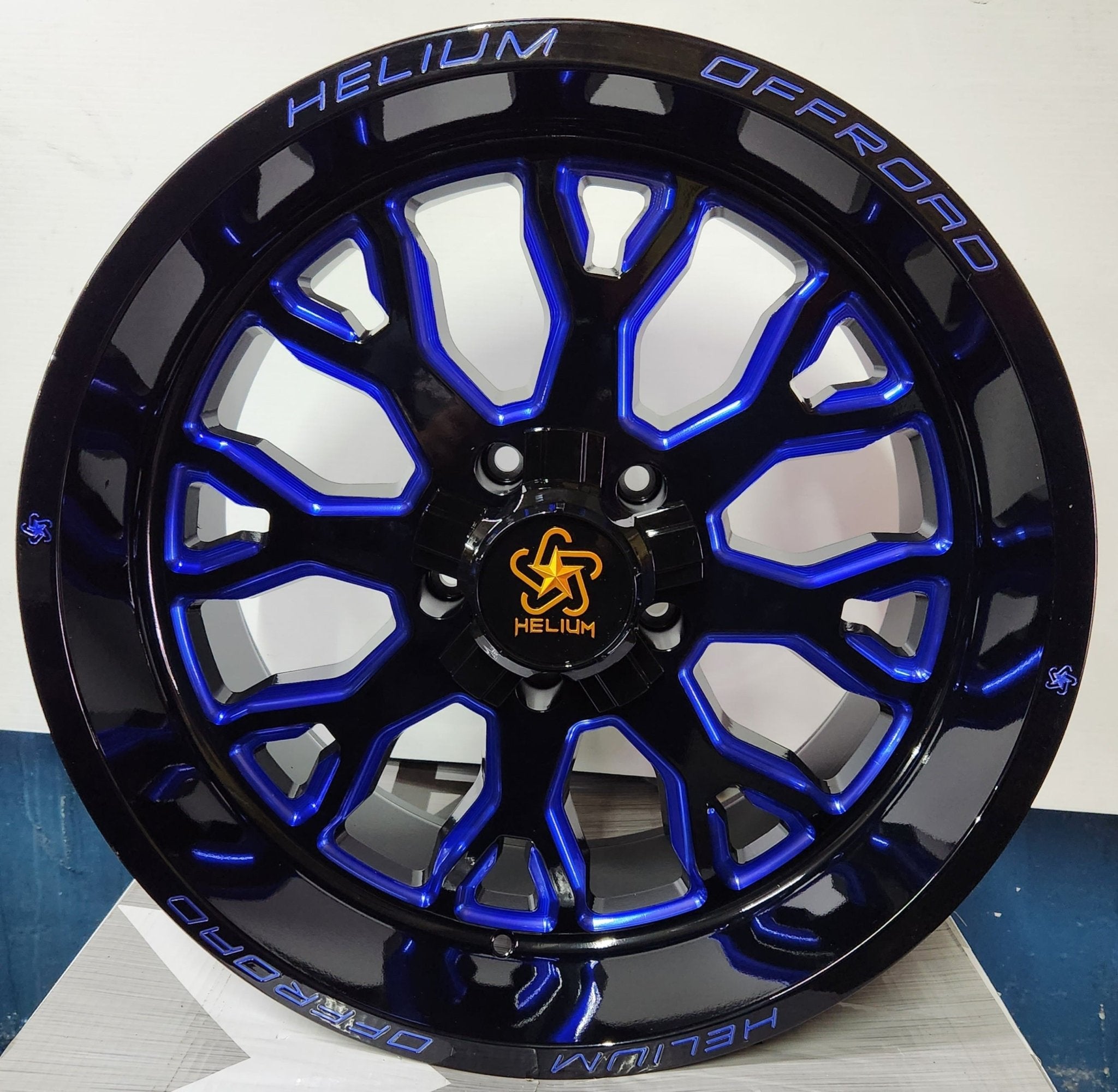HELIUM HC - 1 - BM 20X10 5X127 5X139.7 GLOSS BLACK WITH BLUE MILLING - Gun Hill Tire House (WTW - WHOLESALE TIRES & WHEELS)